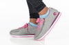 Child wearing Billy Grey/Fuchsia Joggers with laces and zipper, showcasing easy on and off design for kids.