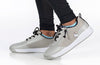 Child wearing grey/black BILLY Sport Court Sneakers with laces and zipper, showcasing easy on/off design for toddlers and big kids.