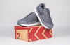 Men&#39;s Charcoal BILLY Goat AFO-Friendly Shoes on box; AFO-compatible, orthopedic sneakers with zipper entry and removable insoles.